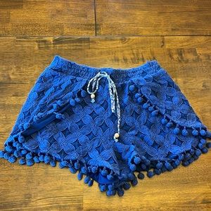 Navy shorts with pom poms